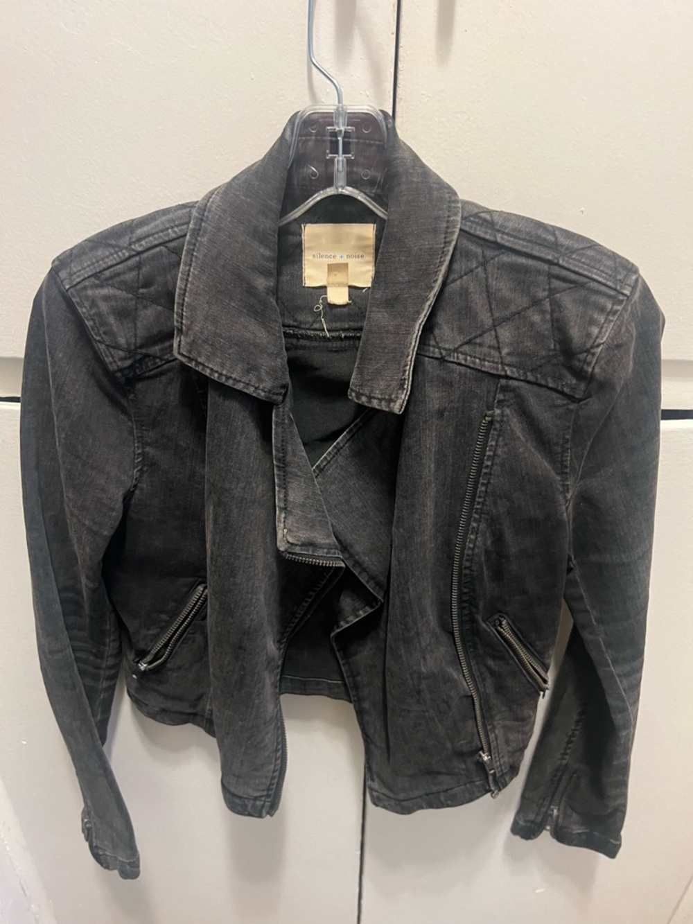 silence + noise black jacket with blue logo tag